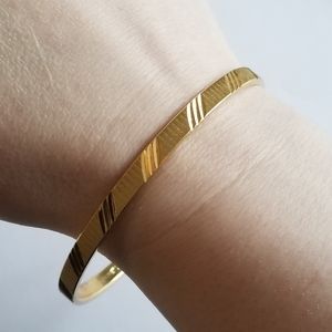 Vintage Monet bangle bracelet gold tone diagonal diamond cut textured